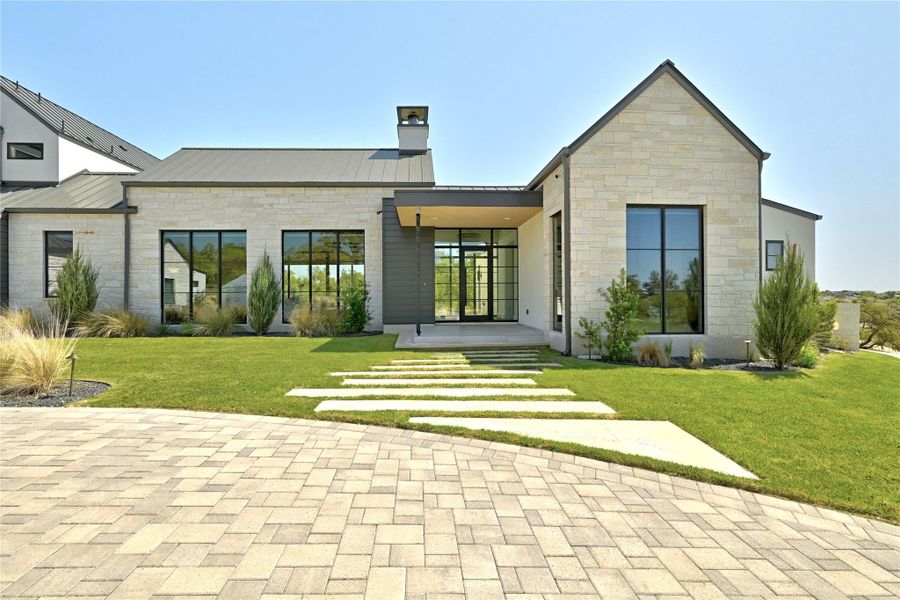 Front exterior of a new home in , Austin, TX, highlighting curb appeal (Image 21). Front exterior of a new home in , Austin, TX, highlighting curb appeal (Image 21).