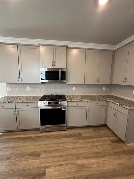 Furnished interior view inside a new home in Mirror Lake at South Harbour, Villa Rica (Image 8).