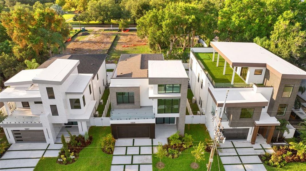 Front exterior of a new home in , Tampa, FL, highlighting curb appeal (Image 26).