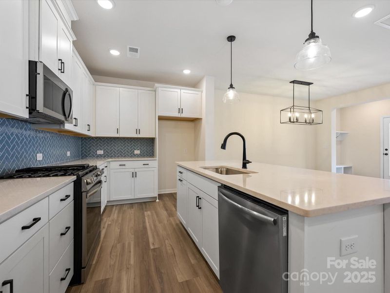 Furnished interior view inside a new home in North Creek Village - Townhomes, Huntersville (Image 8).