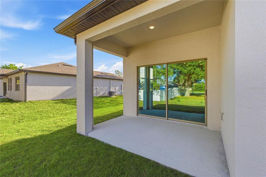 Exterior details and patio area of a home in , North Port (Image 25).