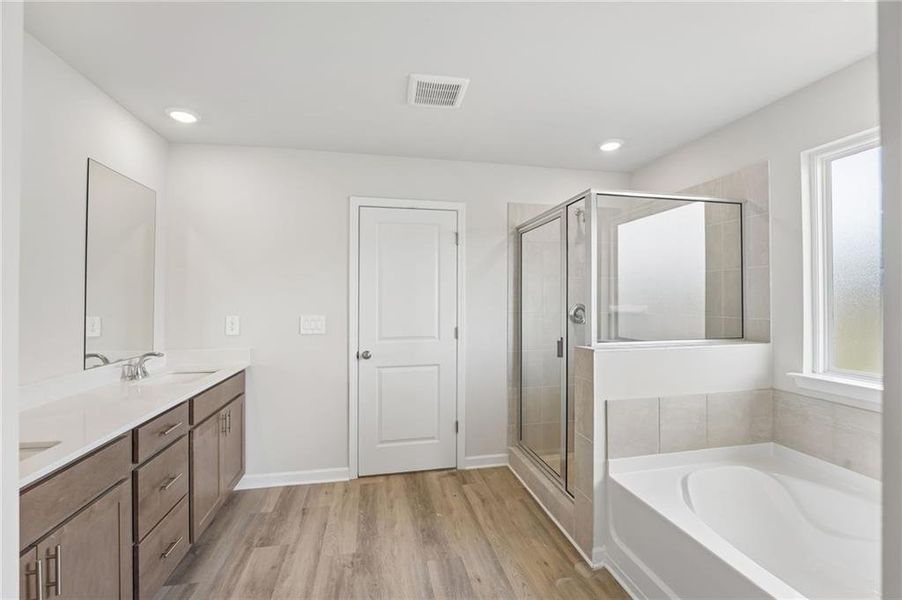 Furnished interior view inside a new home in Northwoods at Mirror Lake, Villa Rica (Image 14).