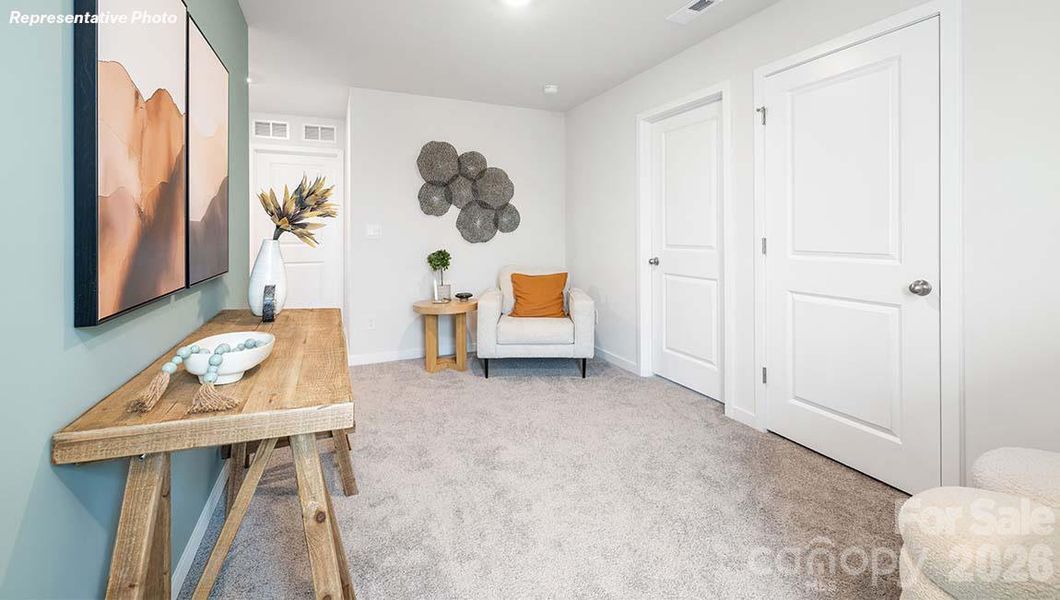 Furnished interior view inside a new home in Cardinal Creek, Charlotte (Image 28).