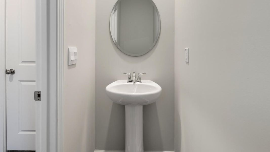 Representative furnished interior of a home built from the TILLMAN by D.R. Horton in Surfside Landing, Hubert (Image 14).