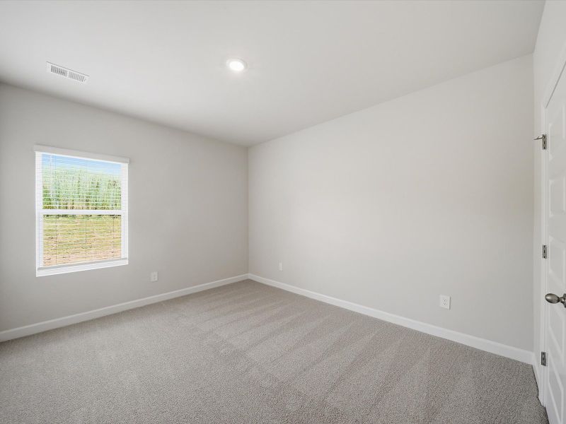 Spacious, unfurnished interior of a new home in The Farm at Wells Creek - Signature Collection, Gray Court (Image 17).