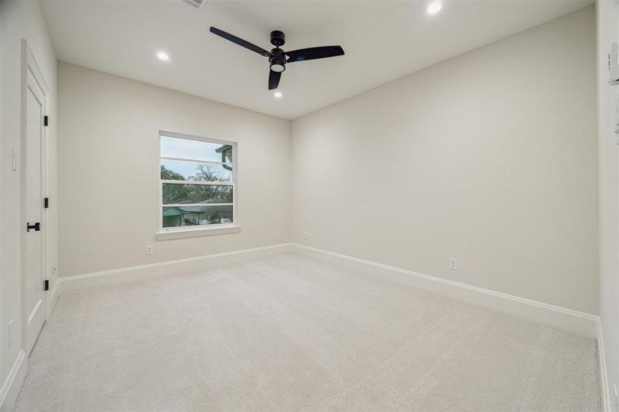 One of four secondary bedrooms upstairs