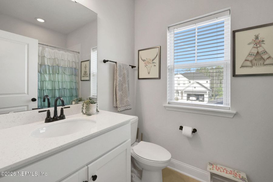 Furnished interior view inside a new home in Settler's Landing at Nocatee, Ponte Vedra (Image 75).