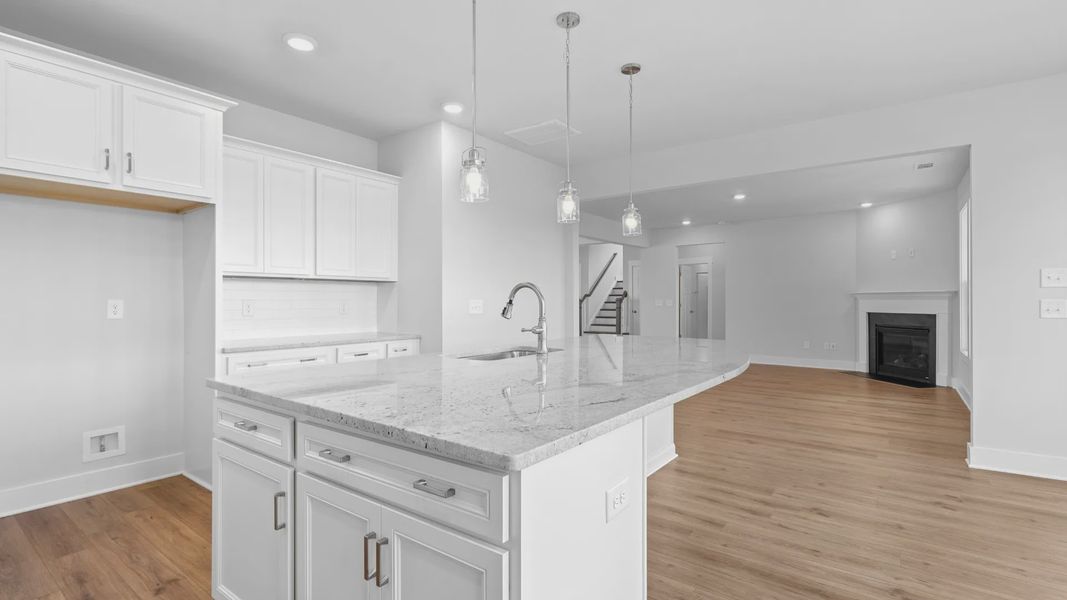 2 story single family home, all white, kitchen