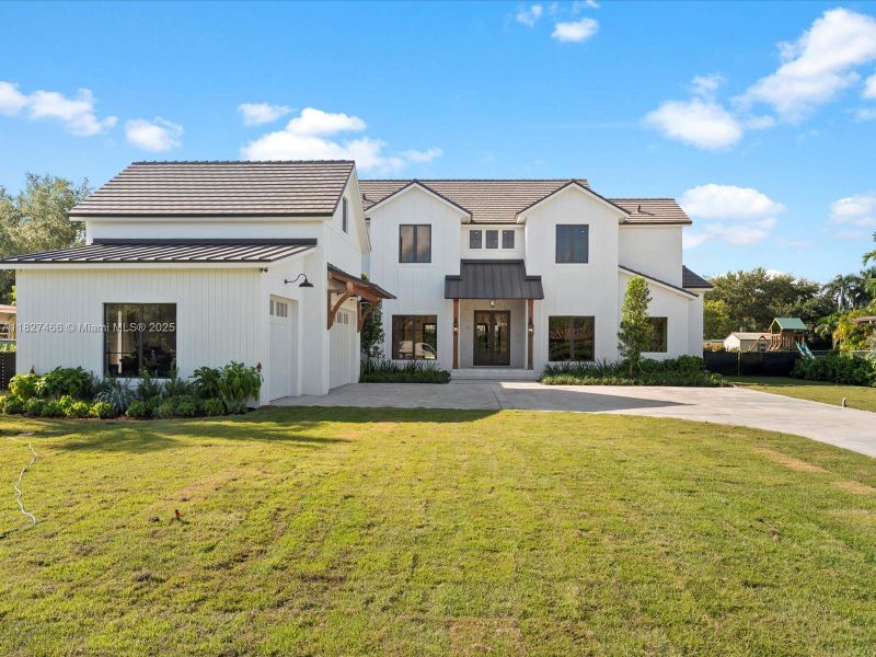 Front exterior of a new home in , Miami, FL, highlighting curb appeal (Image 21).