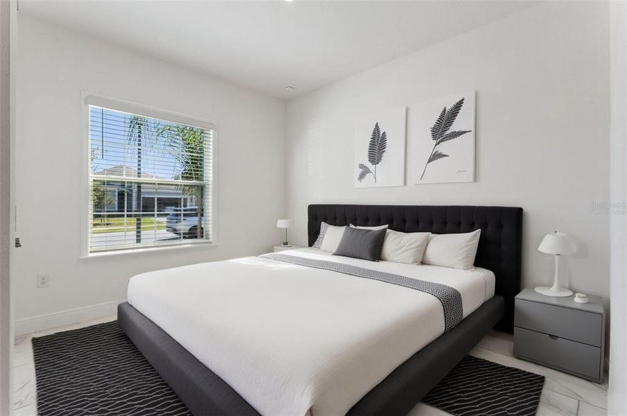 Furnished interior view inside a new home in Villa Pass, Mascotte (Image 14). Furnished interior view inside a new home in Villa Pass, Mascotte (Image 14).