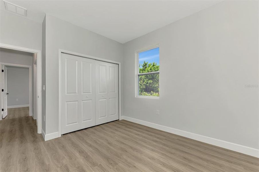 Spacious, unfurnished interior of a new home in , Port Charlotte (Image 14).