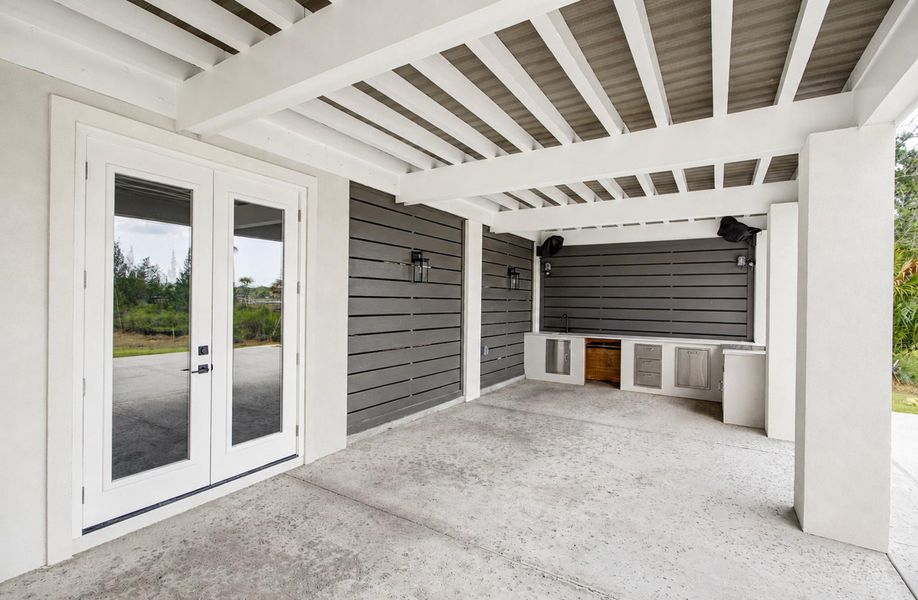 Exterior details and patio area of a home in , Awendaw (Image 15).