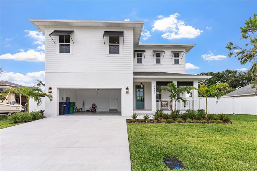 Front exterior of a new home in , Tampa, FL, highlighting curb appeal (Image 31). Front exterior of a new home in , Tampa, FL, highlighting curb appeal (Image 31).