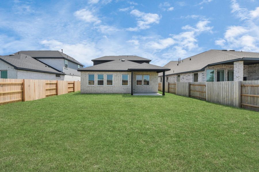 Exterior details and patio area of a home in 50' Traditional Homes at Elyson, Katy (Image 23).