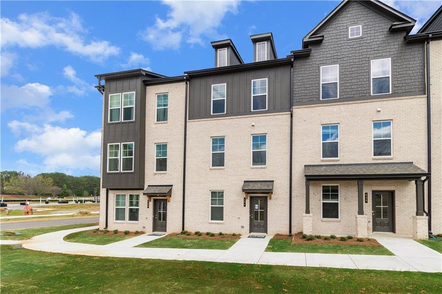 Front exterior of a new home in Daybreak, Newnan, GA, highlighting curb appeal (Image 15).