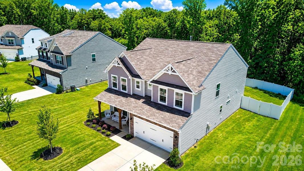 Front exterior of a new home in Winterlake, Gastonia, NC, highlighting curb appeal (Image 24).