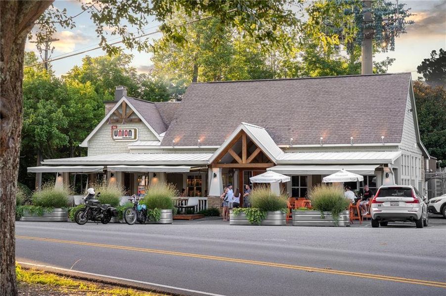 Front exterior of a new home in Echo at Crabapple, Milton, GA, highlighting curb appeal (Image 24). Front exterior of a new home in Echo at Crabapple, Milton, GA, highlighting curb appeal (Image 24).