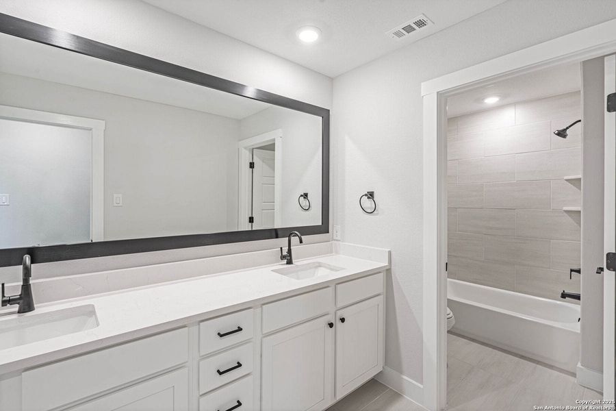 Furnished interior view inside a new home in Potranco West, Castroville (Image 7).