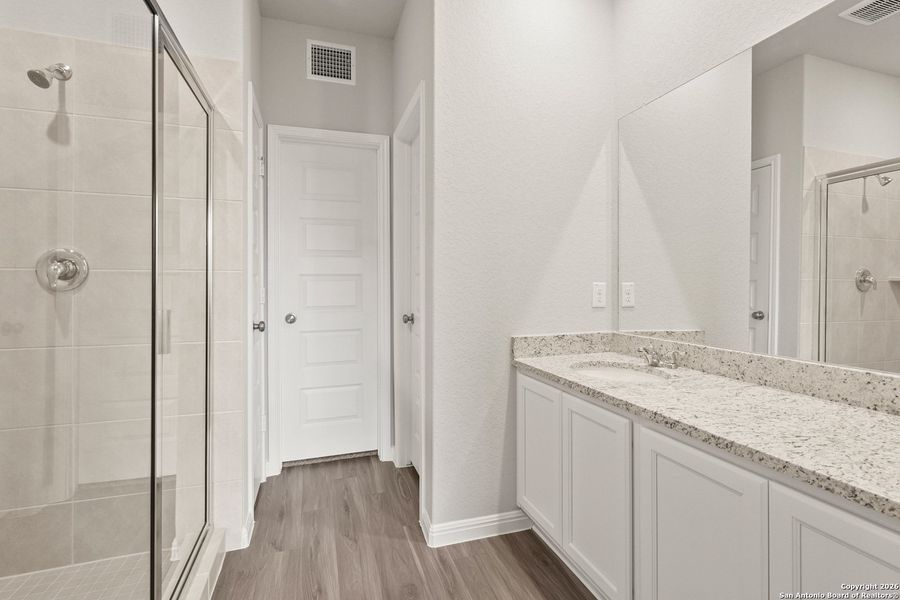 Furnished interior view inside a new home in Cinco Lakes, San Antonio (Image 11).