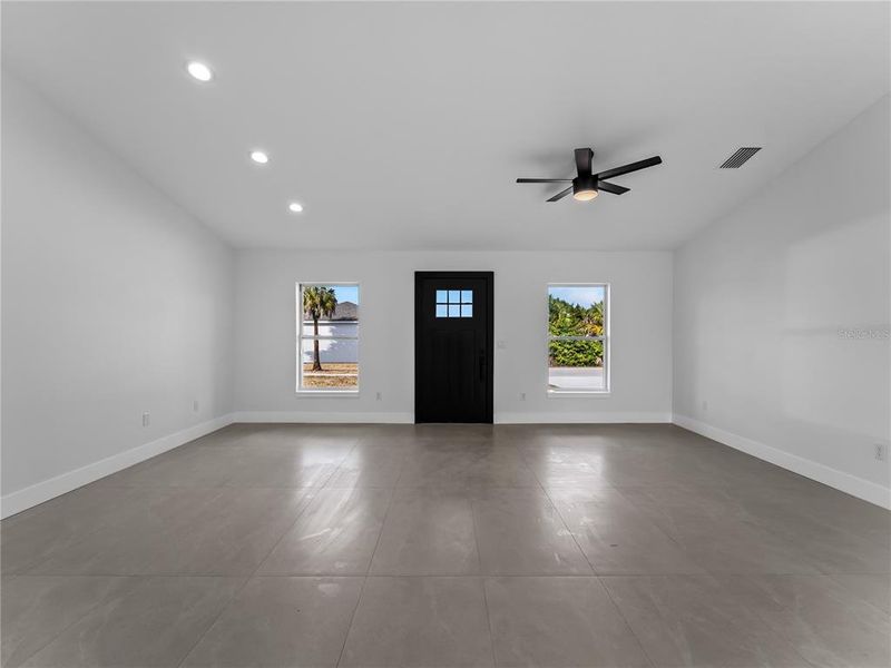 Spacious, unfurnished interior of a new home in , Port Charlotte (Image 51).