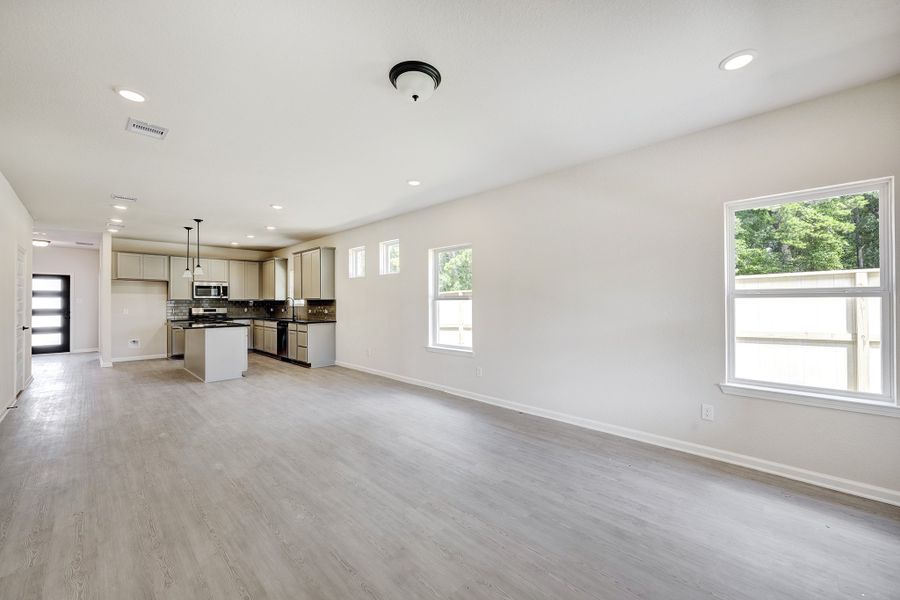 The Davenport II- Family Room into Dining Area and Kitchen The Davenport II- Family Room into Dining Area and Kitchen