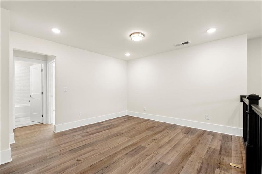 Spacious, unfurnished interior of a new home in Hillgrove Preserve, Powder Springs (Image 36).