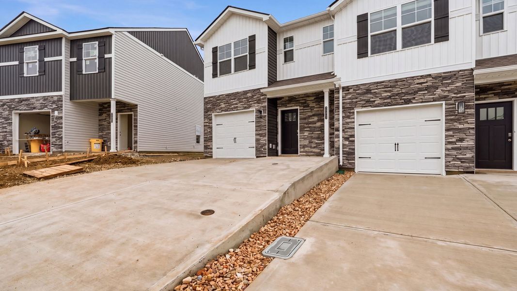 Exterior details and patio area of a home in The Arbor Townhomes, Kingsport (Image 3).