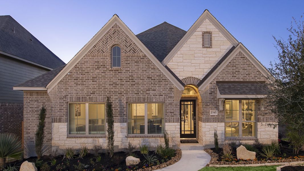 Front exterior of a new home in Briggs Ranch, San Antonio, TX, highlighting curb appeal (Image 25).