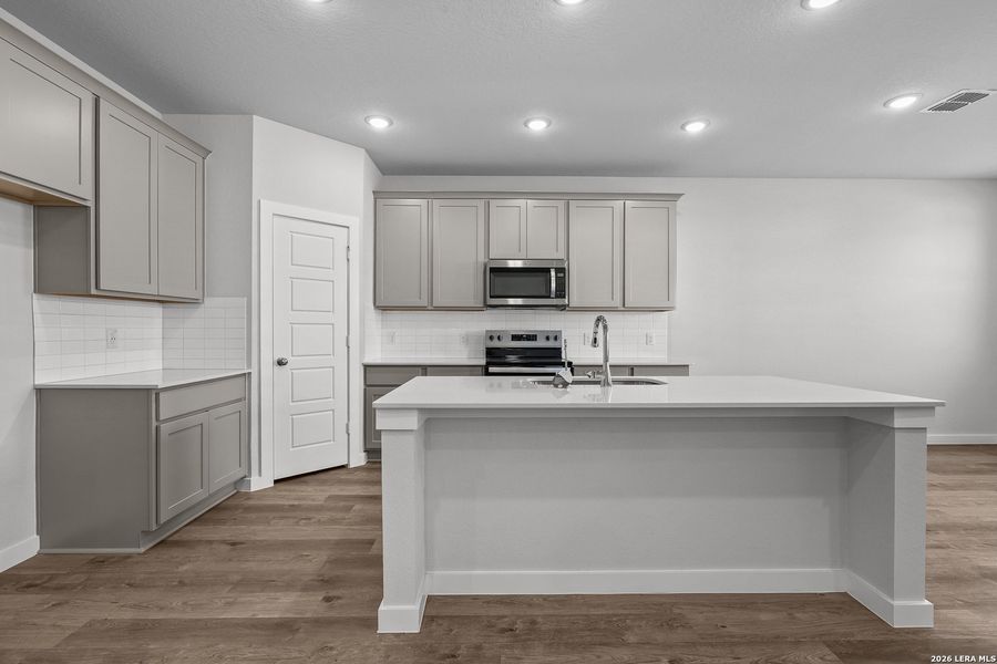 Furnished interior view inside a new home in Cinco Lakes, San Antonio (Image 3).