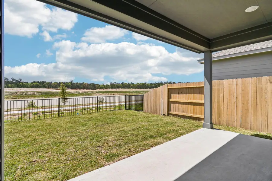 Exterior details and patio area of a home in , Conroe (Image 2). Exterior details and patio area of a home in , Conroe (Image 2).