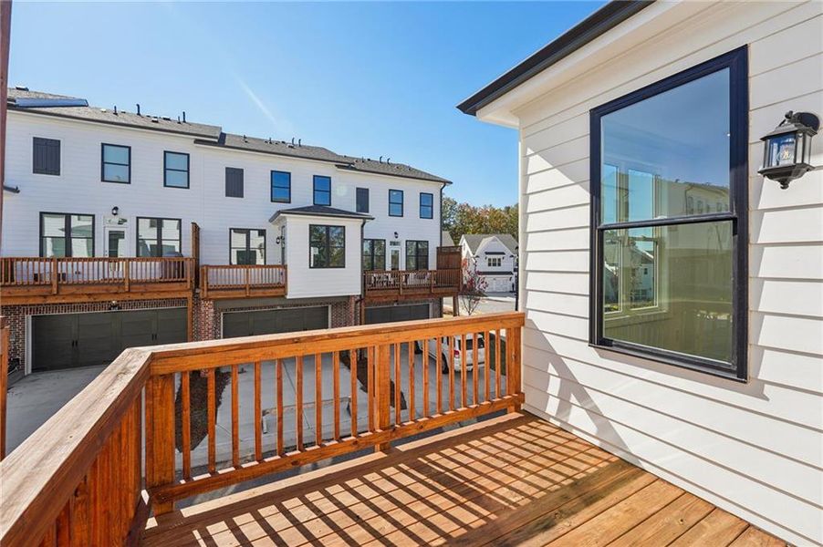 Exterior details and patio area of a home in Palisades Townhomes, Cumming (Image 4).