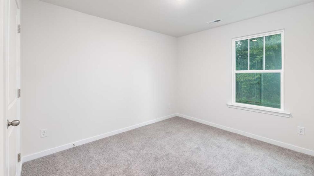 Spacious, unfurnished interior of a new home in Reedy Creek Preserve, Charlotte (Image 19).