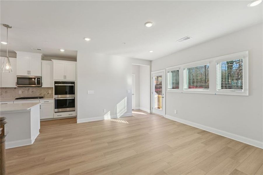Spacious, unfurnished interior of a new home in Hemingway - Highland Series, Cumming (Image 49).