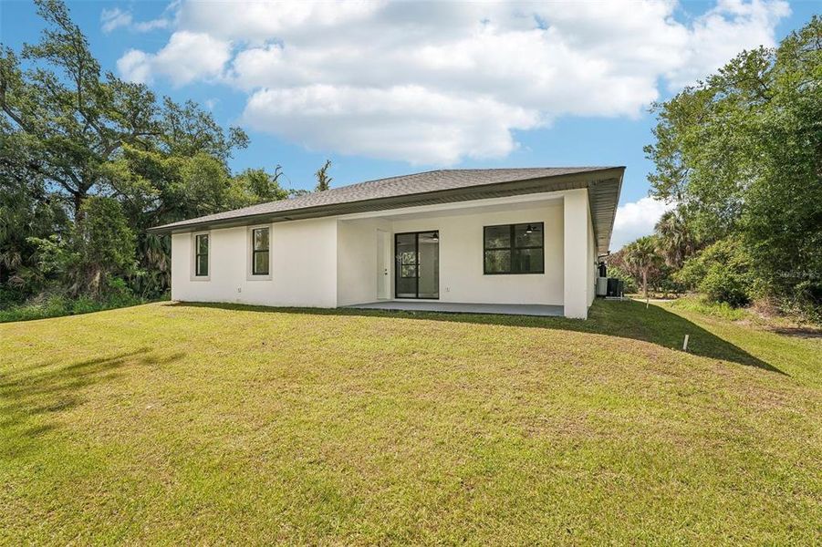 Exterior details and patio area of a home in , Port Charlotte (Image 28).