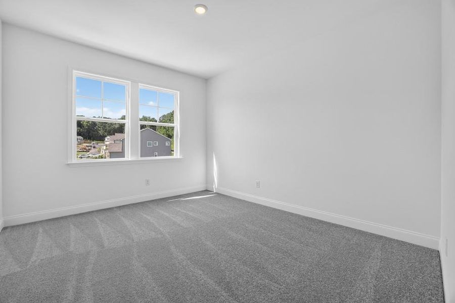 Spacious, unfurnished interior of a new home in Stratford Hills, Ball Ground (Image 33).