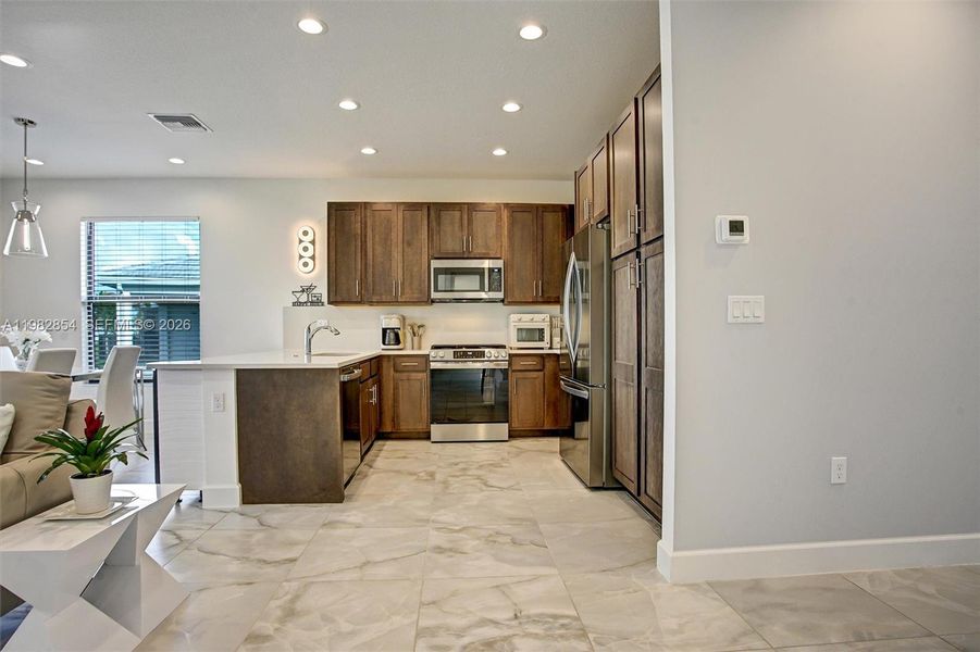 Furnished interior view inside a new home in , Port St. Lucie (Image 5).