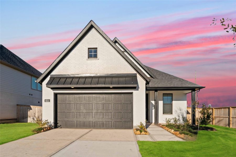 Front exterior of a new home in Arabella on the Prairie, Richmond, TX, highlighting curb appeal (Image 2).