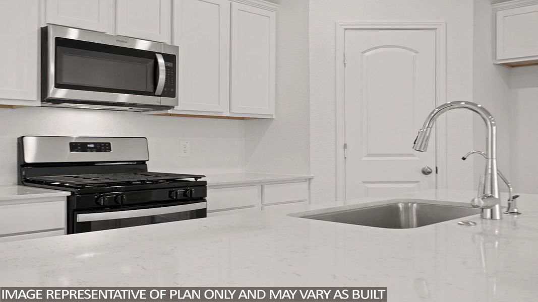 Close-up of interior finishes inside a home in Sunterra, Katy (Image 12).