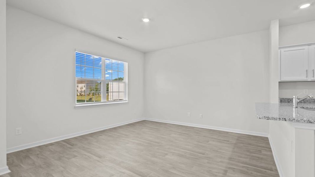 Spacious, unfurnished interior of a new home in The Townes at Ridgewood Farms, Winterville (Image 17).