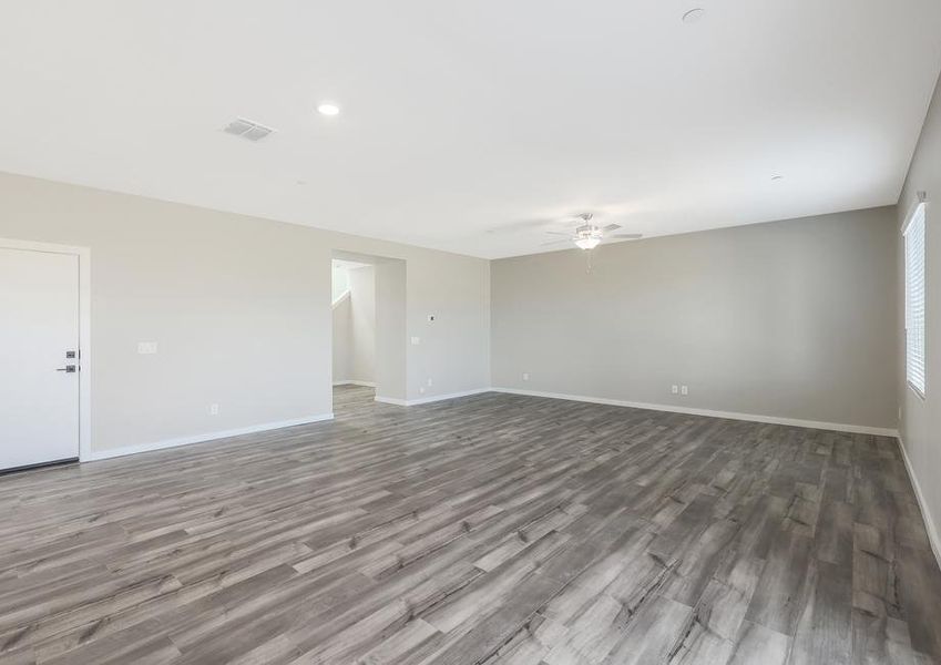 Expansive living room connected to the dining area.