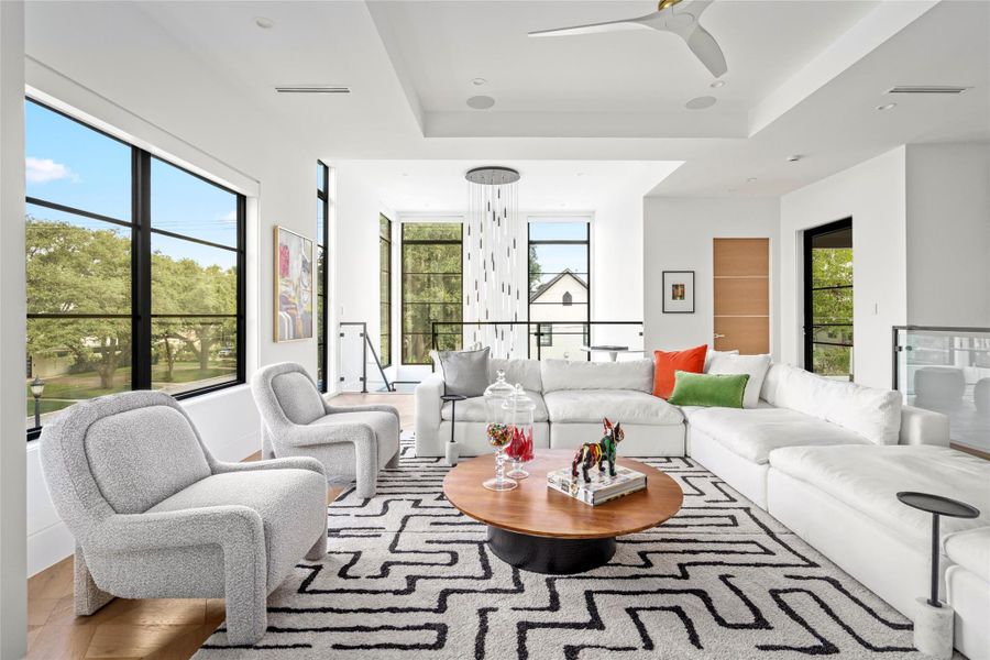 [Game Room] Positioned on the second floor, the game room has access to the balcony overlooking the pool and patio.