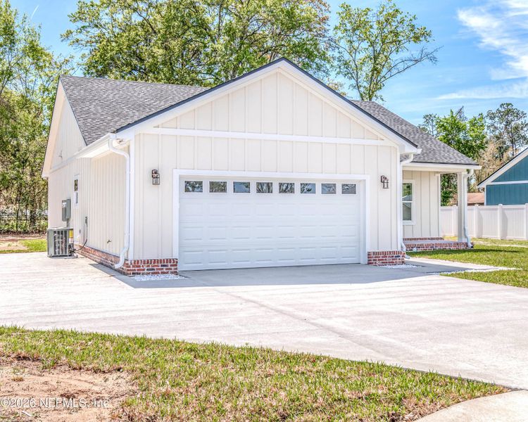 Front exterior of a new home in , Macclenny, FL, highlighting curb appeal (Image 29).