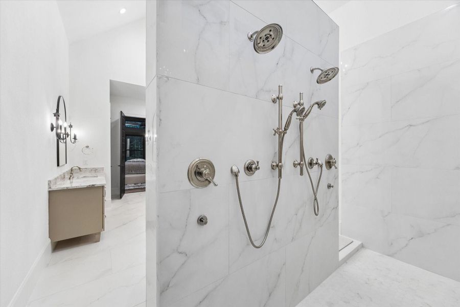 Designed to rejuvenate, the expansive walk-through shower features multiple body jets that create a true spa experience. Premium finishes and impeccable craftsmanship transform everyday routines into moments of relaxation.