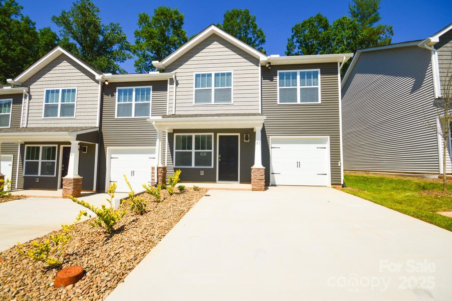 Front exterior of a new home in Aberdeen Place, Asheville, NC, highlighting curb appeal (Image 1).