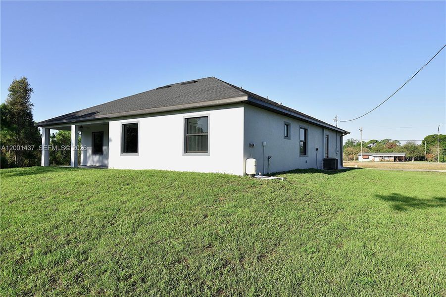 Exterior details and patio area of a home in , Lehigh Acres (Image 24).