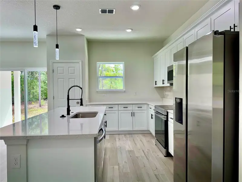 Furnished interior view inside a new home in , Citrus Springs (Image 5).