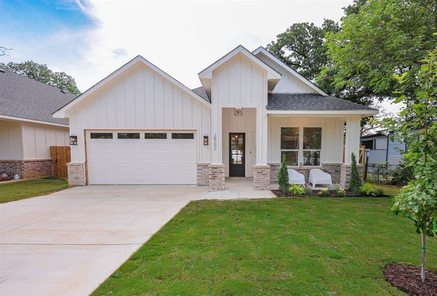 Front exterior of a new home in , Lake Worth, TX, highlighting curb appeal (Image 1). Front exterior of a new home in , Lake Worth, TX, highlighting curb appeal (Image 1).