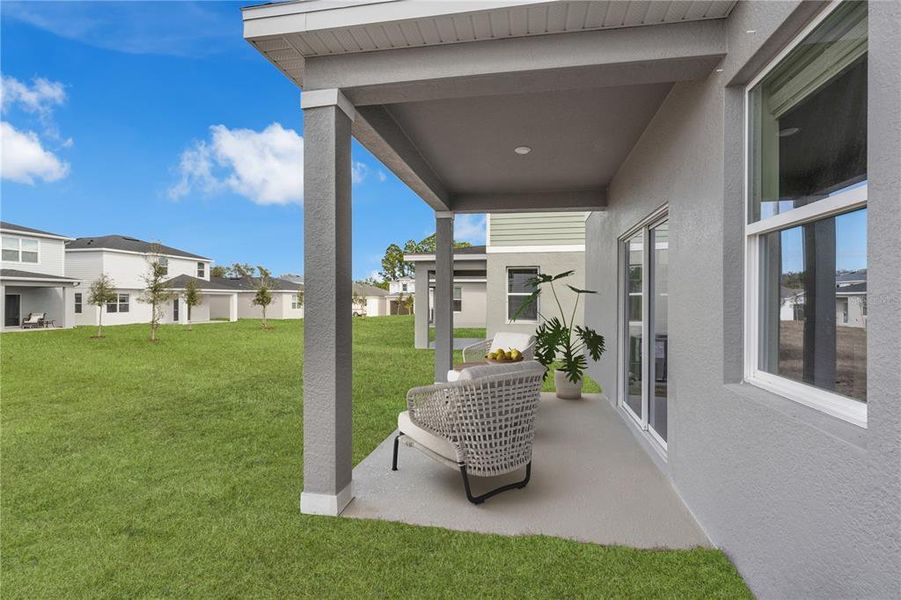 Exterior details and patio area of a home in Wynnstone, Davenport (Image 2). Exterior details and patio area of a home in Wynnstone, Davenport (Image 2).