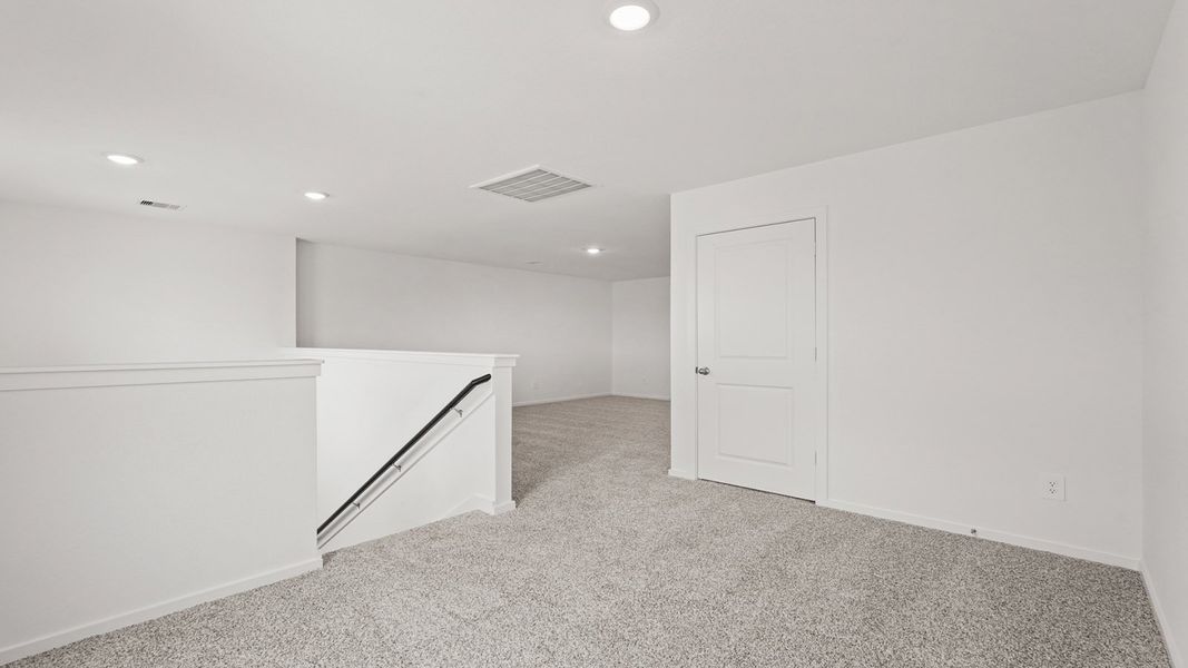 Spacious, unfurnished interior of a new home in Sunterra, Katy (Image 15).