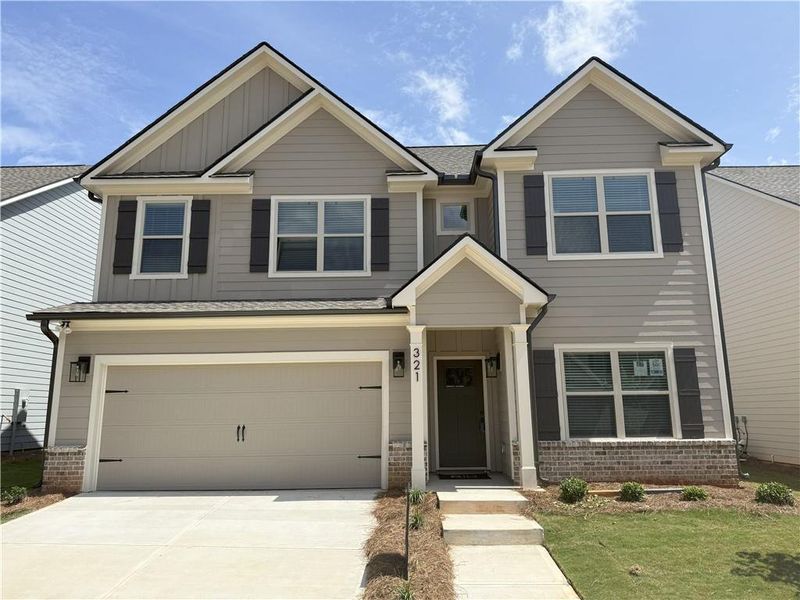 Front exterior of a new home in Ridge Pointe, Athens, GA, highlighting curb appeal (Image 1). Front exterior of a new home in Ridge Pointe, Athens, GA, highlighting curb appeal (Image 1).